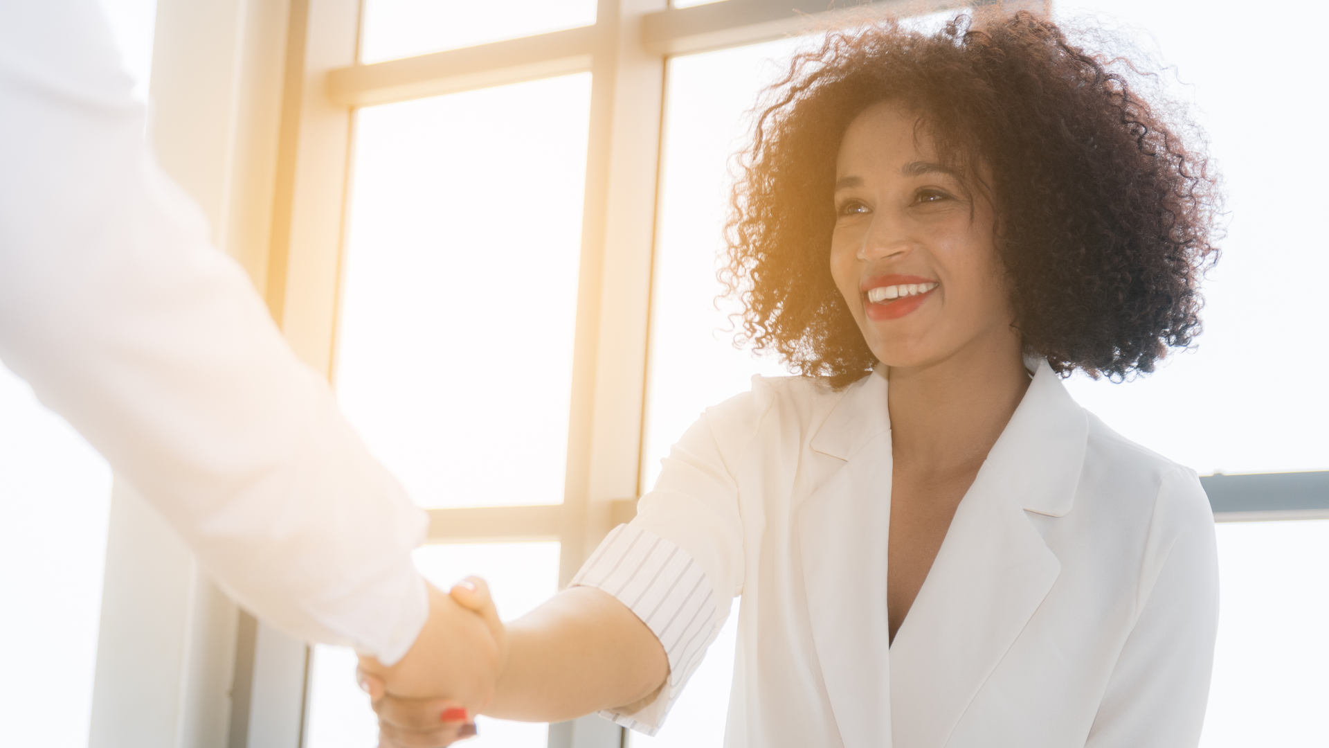 woman shaking hands